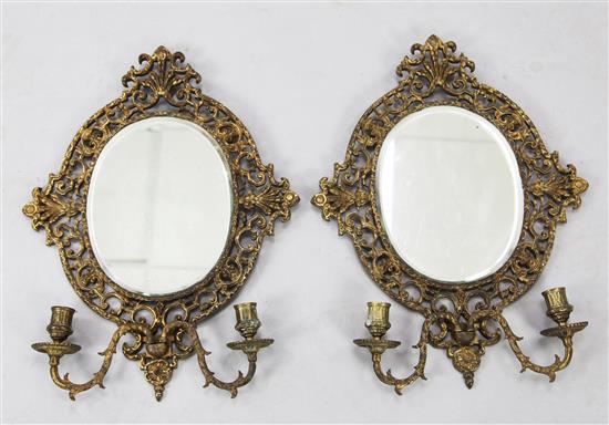 A pair of Victorian gilt cast brass girandoles, 20in.